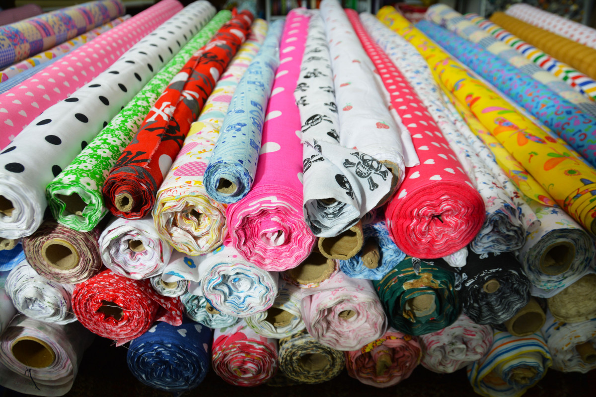 Rolls of fabric staged for cutting at the manufacturing facility
